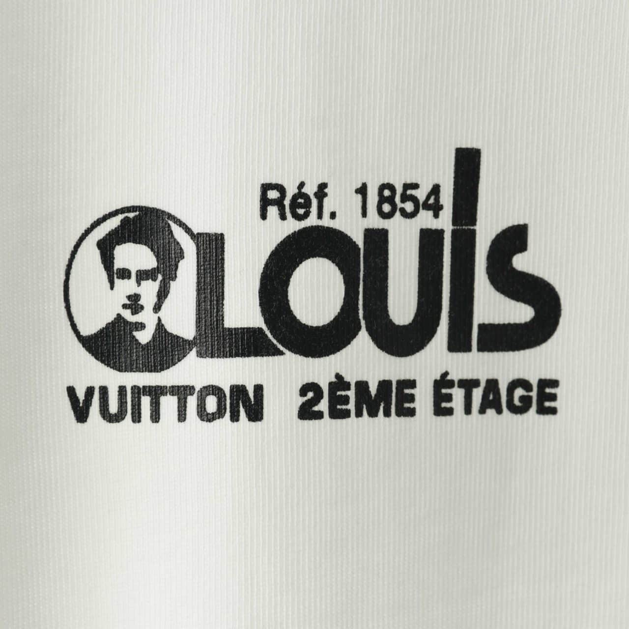 l0*is V*t0n red and blue logo badge