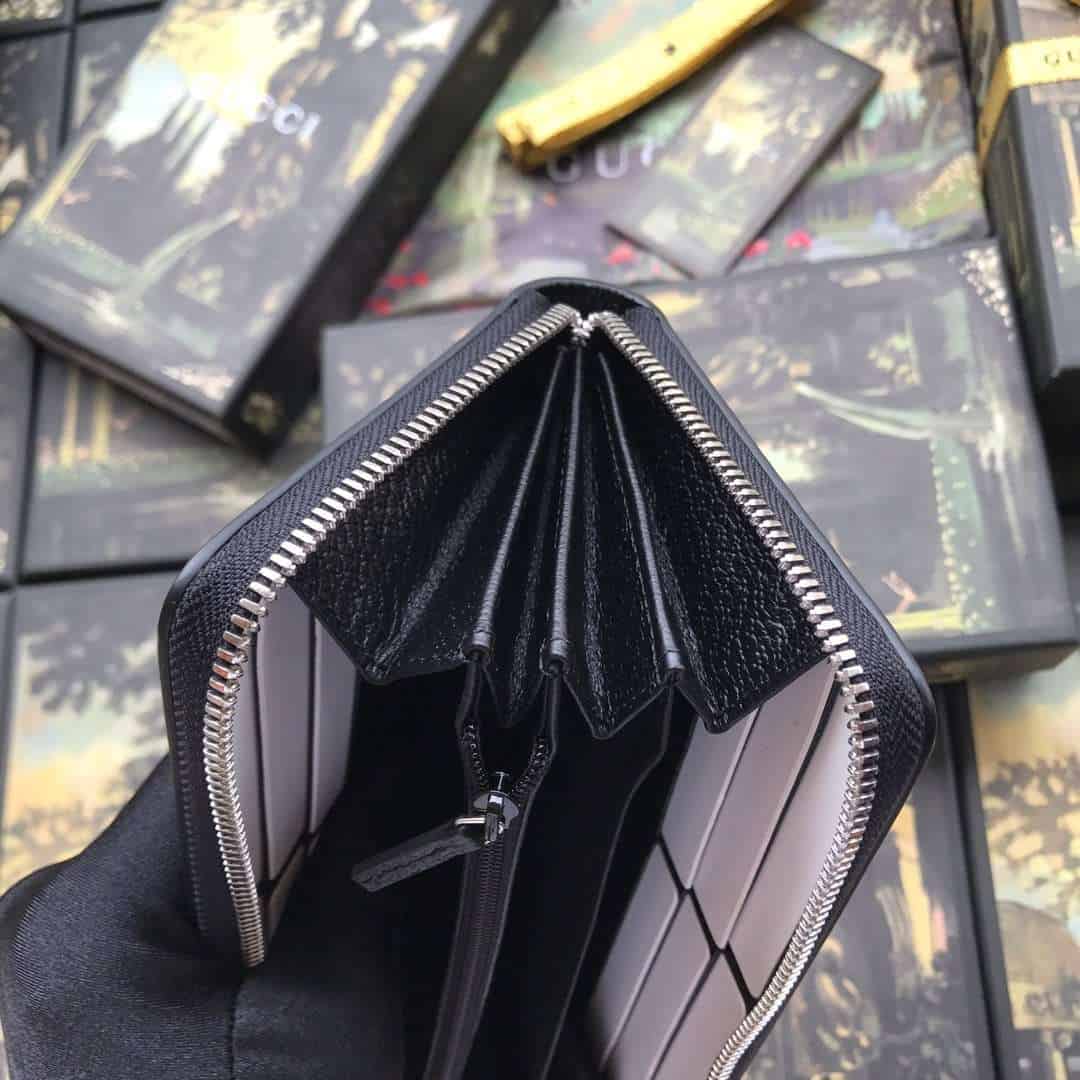 G*u*i leather zip around wallet with web