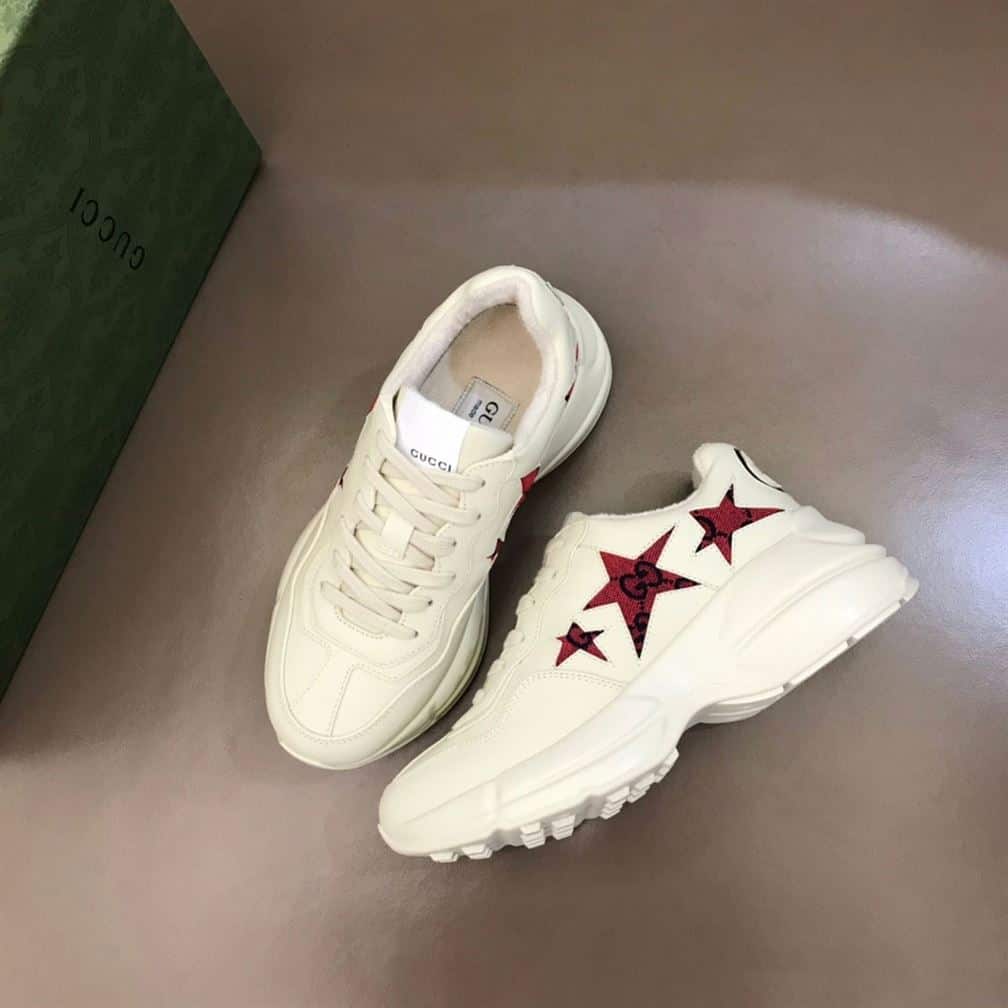 G*u*i rhyton sneakers with star - gc060