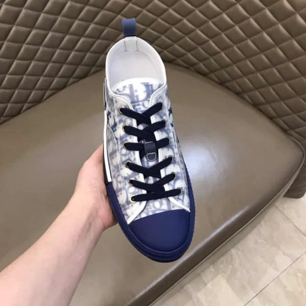 D*or b23 low-top sneaker in blue D*or oblique – cd84