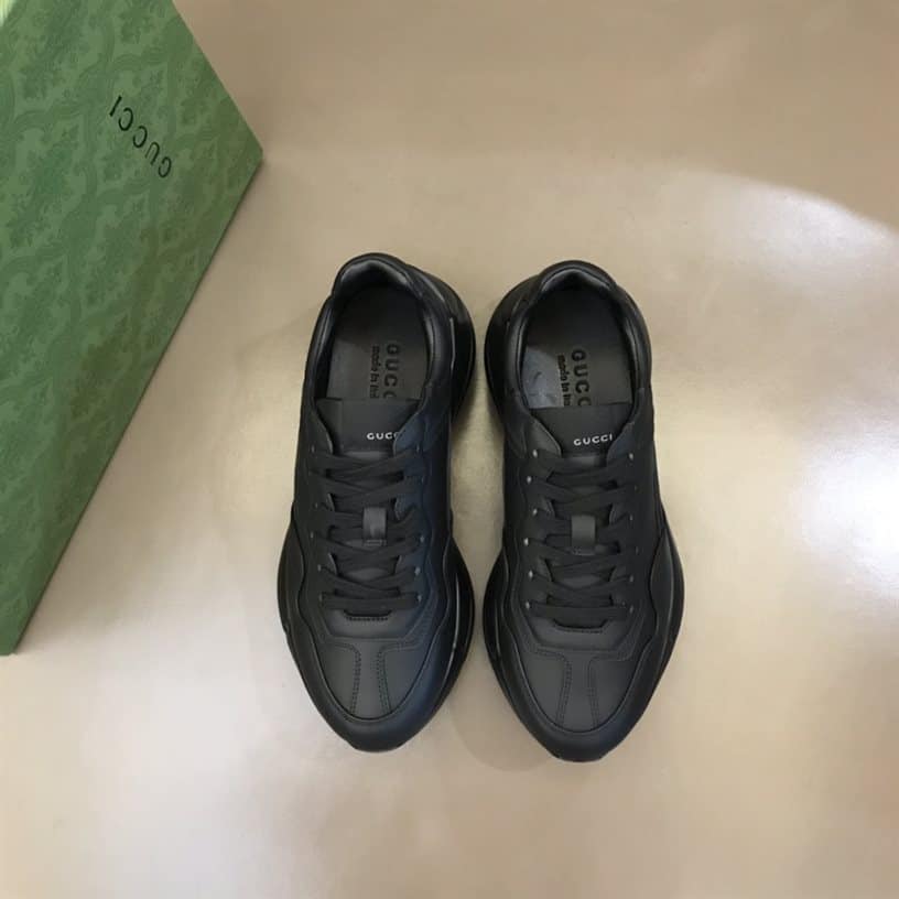 G*u*i rhyton low top sneakers in black and white – gc125