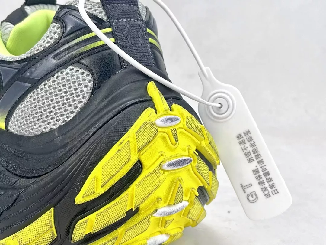 Ba*len*cia*ga men's 10xl sneaker in grey/yellow - bb272